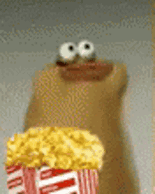 1AAApopcorns-crackhead-eating.gif