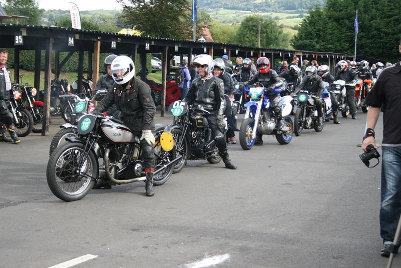 Motorcycle riders prepare for the hill climb